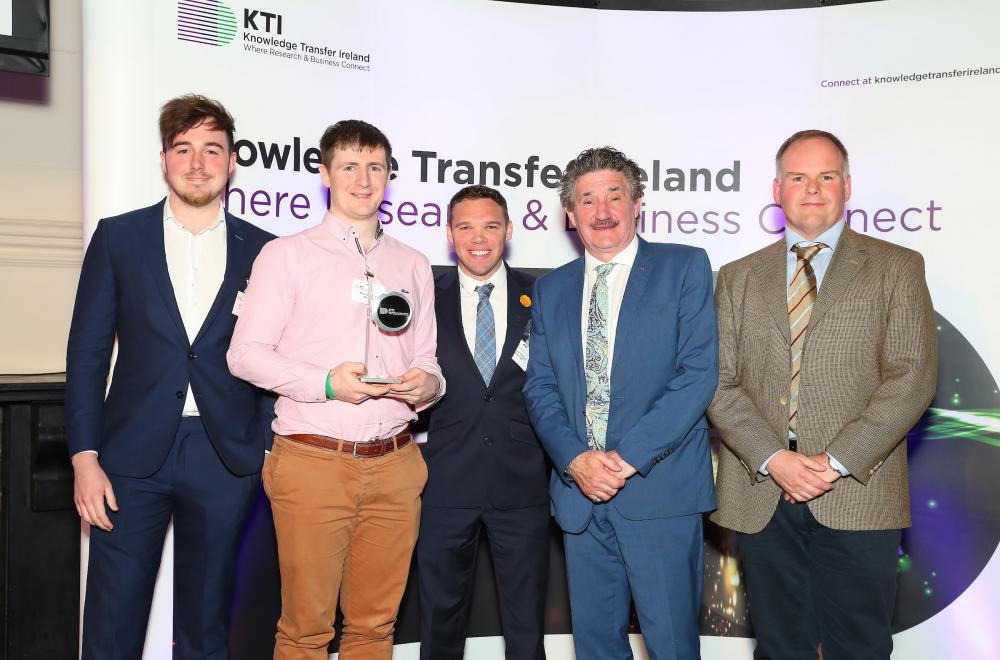 Pictured (L-R): Kevin Brosnan with colleagues and Minister John Halligan