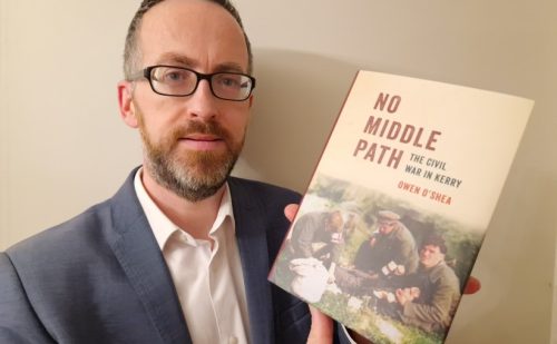 Owen O'Shea pictured holding his book
