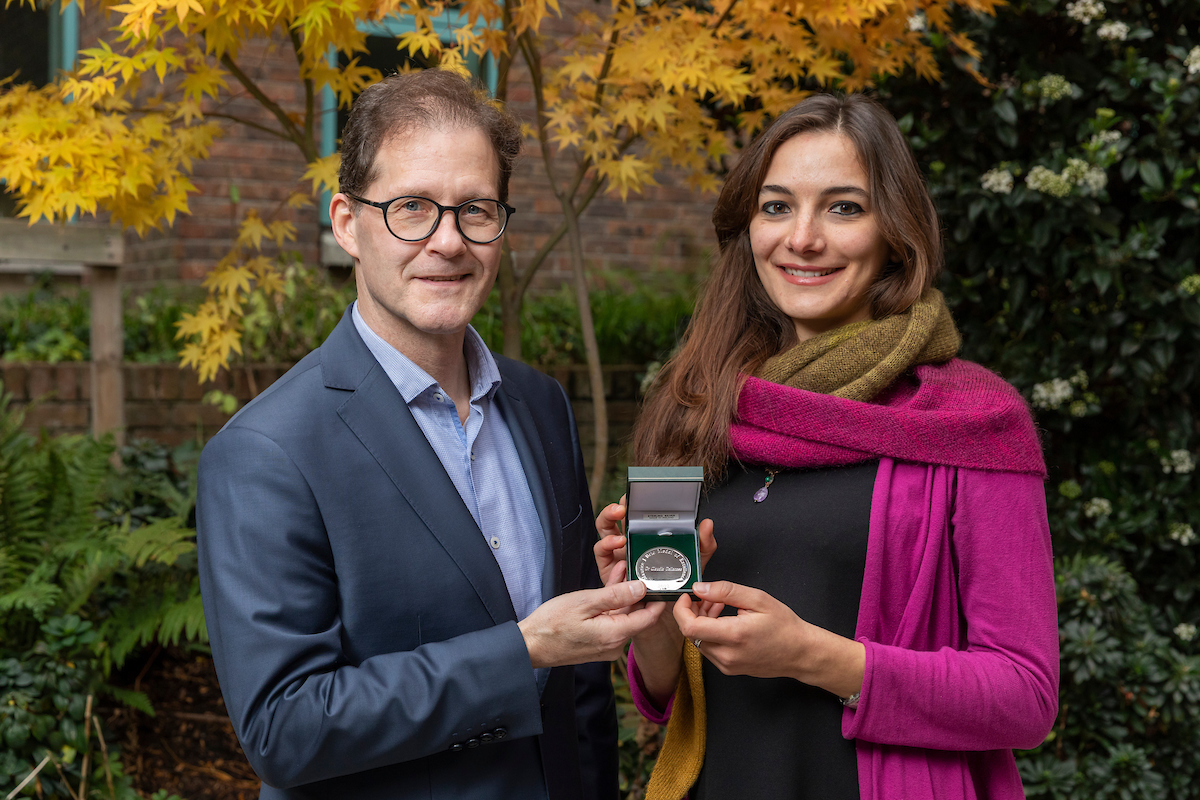 Daniel Carey pictured presenting medal to winner
