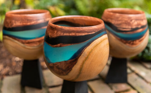 Three IRC Researcher of the Year Award trophies, designed by Kathleen Walsh