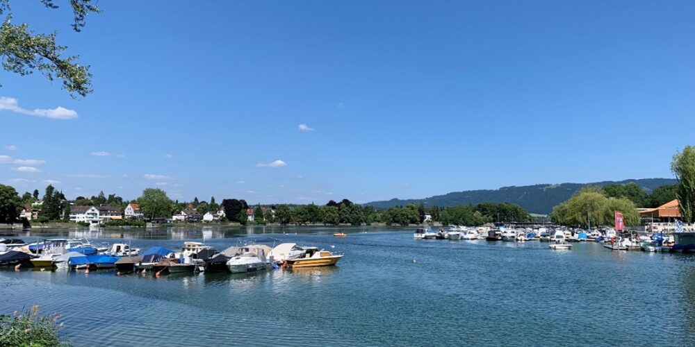 Small boats pictured on a lake