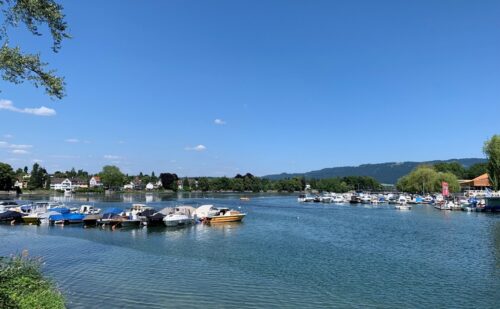 Small boats pictured on a lake