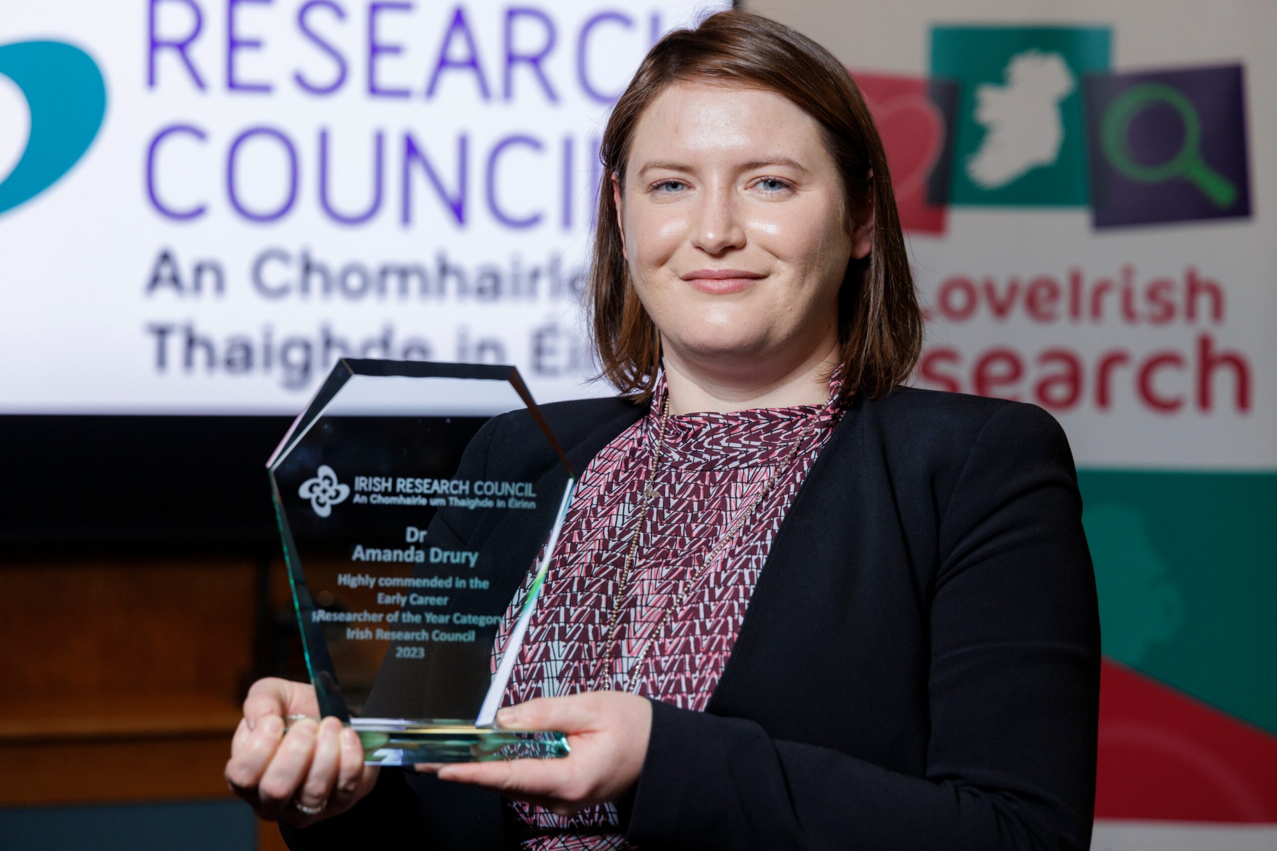 Dr Amanda Drury pictured holding a trophy
