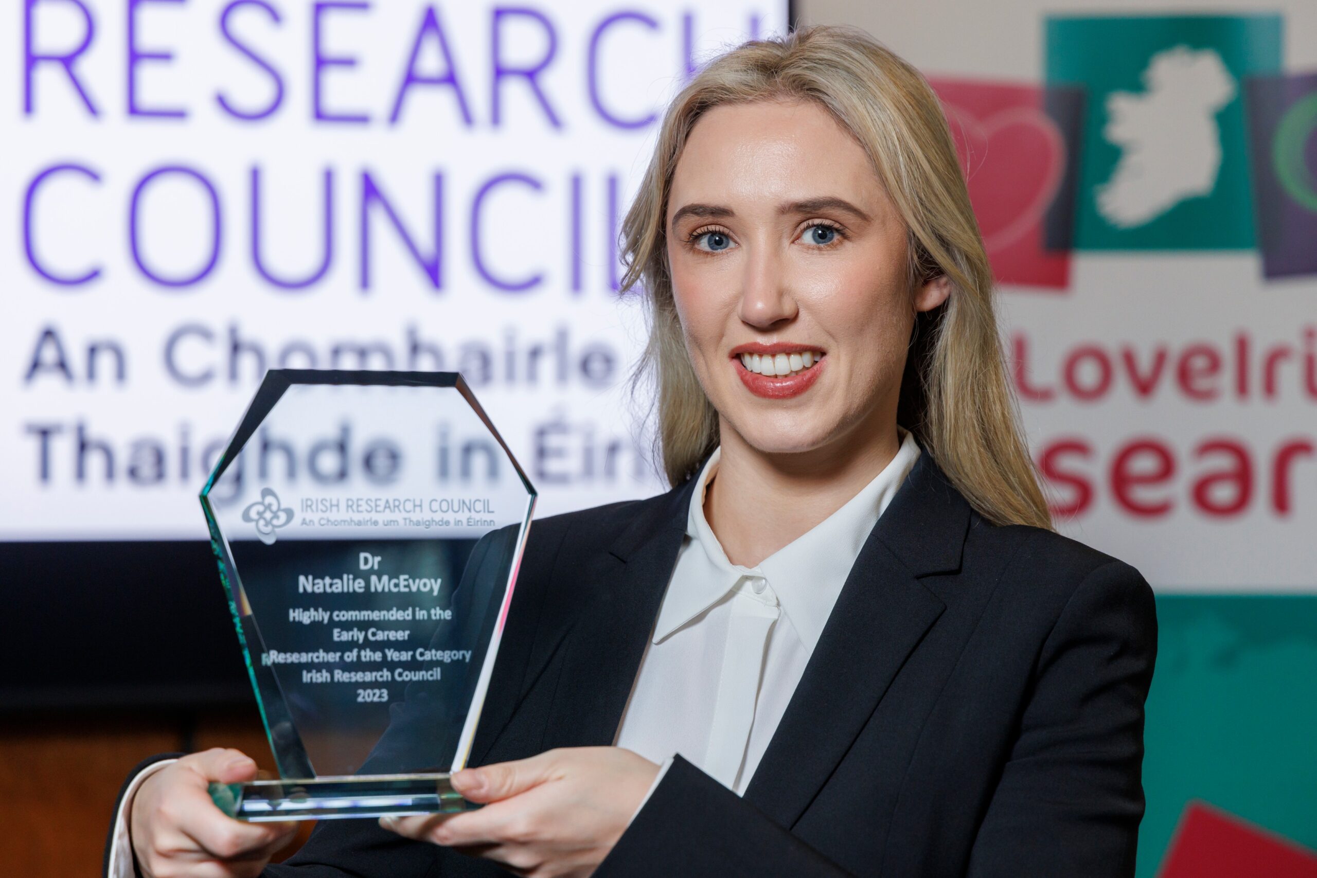 Dr Natalie McEvoy pictured holding a trophy