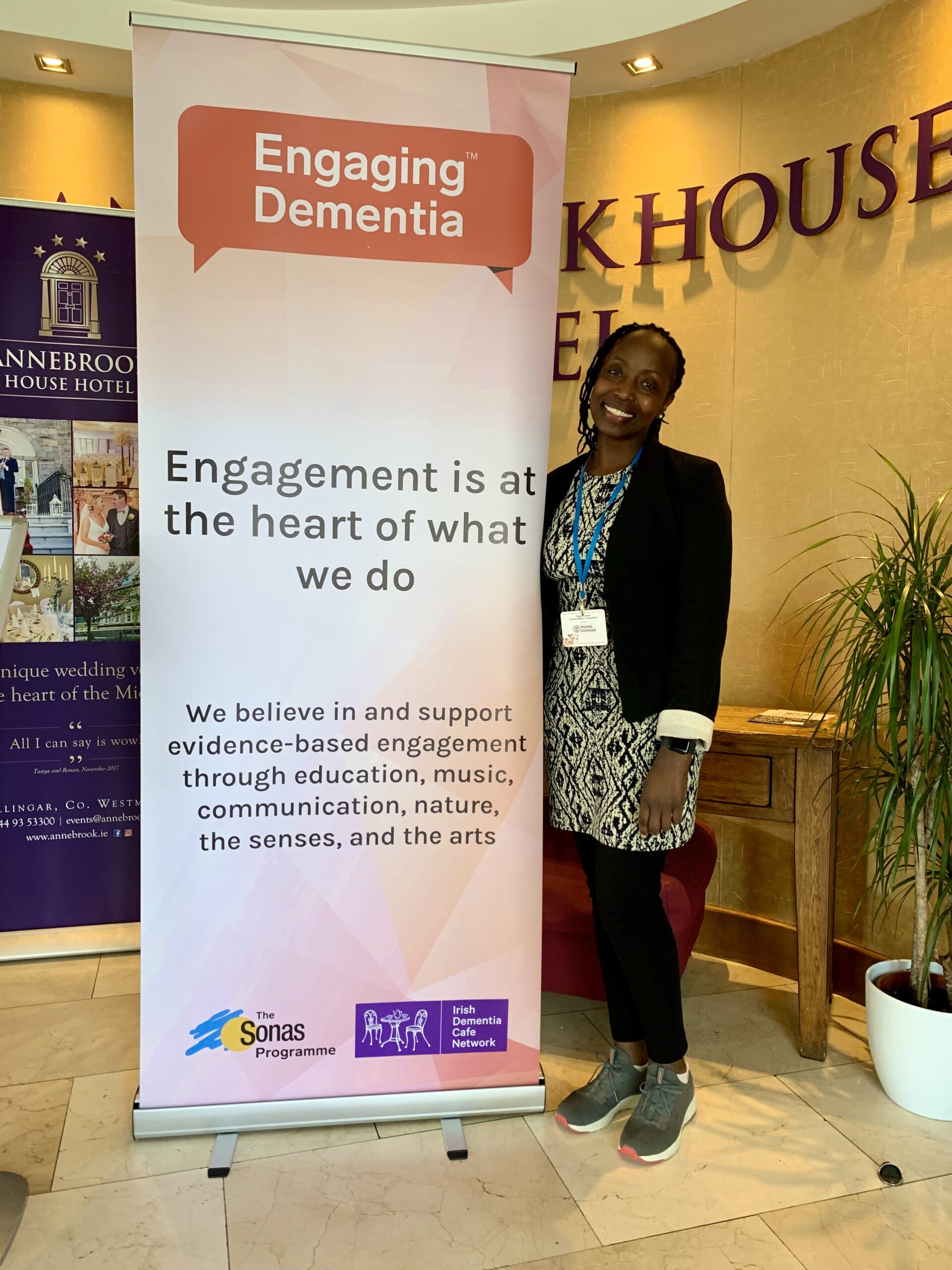 Dr Purity Mwendwa photo at conference stand