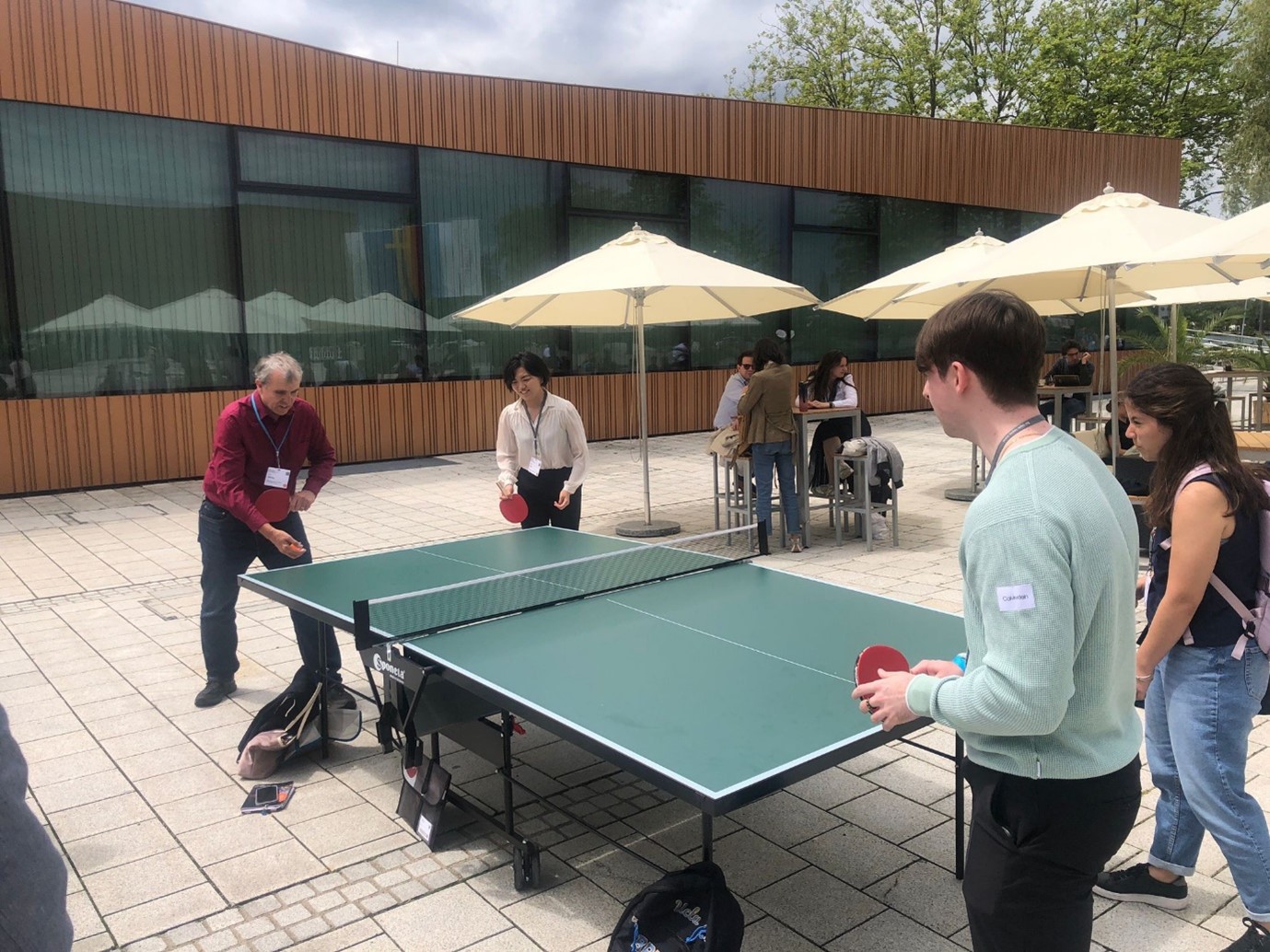 Picture of Paul Cannon playing Ping Pong with Nobel Laureate Eric Betzig